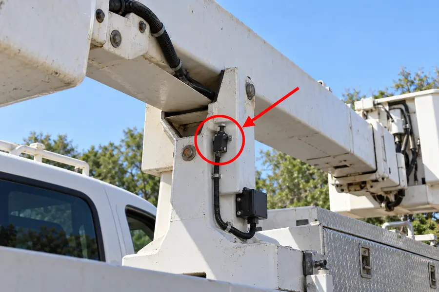 Illustration of boom stowed switch with the monitored part marked